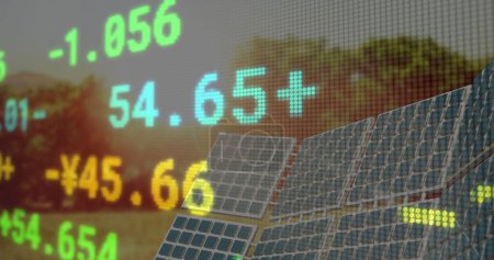Photo for Image of financial data and graphs over solar panels. Green energy, eco power, finance and economy concept digitally generated image. - Royalty Free Image