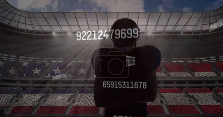 Foto de Múltiples números cambiantes sobre la silueta del jugador de rugby masculino contra el estadio deportivo en segundo plano. competencia deportiva y concepto de torneo - Imagen libre de derechos