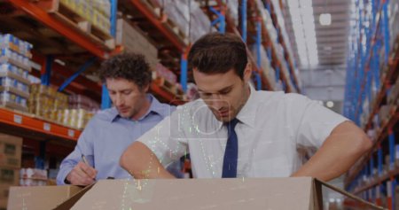 Photo for Image of data processing over diverse male workers in warehouse. global business and digital interface concept digitally generated image. - Royalty Free Image