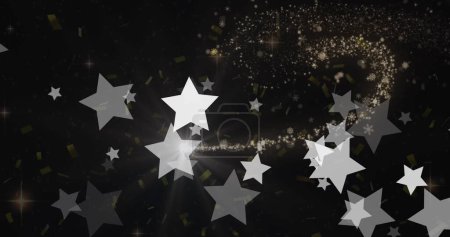 Téléchargez les photos : Image de flocons de neige et d'étoiles sur fond noir. Noel, tradition et concept de célébration image générée numériquement. - en image libre de droit