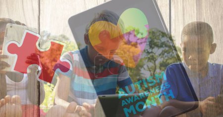 Image of colourful puzzle pieces and smartphone over kids friends using electronic devices. autism, learning difficulties, support and awareness concept digitally generated image.