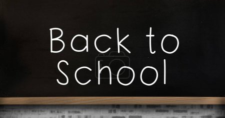 Photo for Image of back to school text over blackboard. education, development and learning concept digitally generated image. - Royalty Free Image
