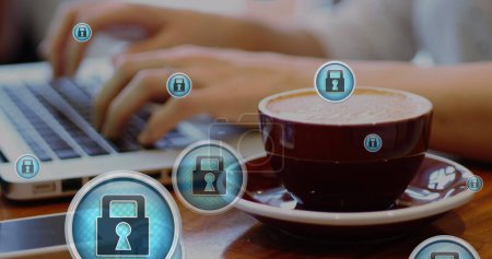 Photo for Image of padlock icons, close up of coffee cup, midsection of caucasian man working on laptop. Digital composite, multiple exposure, protection, beverage, drink and technology concept. - Royalty Free Image