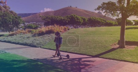 Photo for African american young woman with electric scooter walking in the park. travel and technology concept - Royalty Free Image