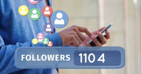 Photo for Digital image of a followers count bar is in the foreground of a man texting on his phone. Digital image of follower icons are flying upwards from the followers count bar - Royalty Free Image