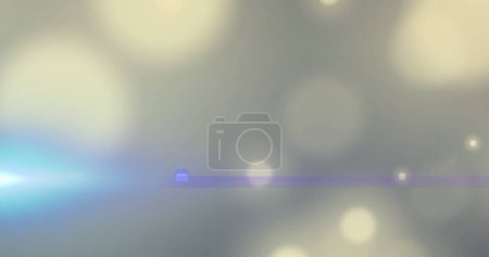 Foto de Imagen de foco azul con destello de lente sobre puntos de luz bokeh en gris. movimiento, energía y luz, concepto de fondo de interfaz abstracta imagen generada digitalmente. - Imagen libre de derechos