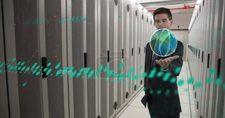 Image of nft text, data processing and caucasian businessman over computer servers. Global cryptocurrency, business, finances, computing and data processing concept digitally generated image.