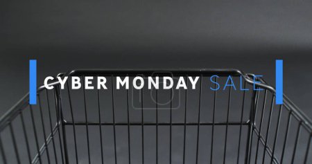 Photo for Image of cyber monday sale text over shopping trolley. Sales, retail, cyber shopping, digital interface, communication, computing and data processing concept digitally generated image. - Royalty Free Image