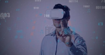 Photo for Image of data processing over men using vr headset. Global business, finances, data processing and digital interface concept digitally generated image. - Royalty Free Image