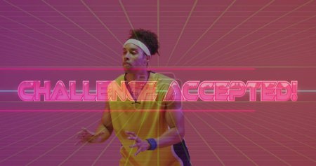 Image of challenge accepted text over neon pattern and biracial basketball player. Sports, competition, image game and communication concept digitally generated image.