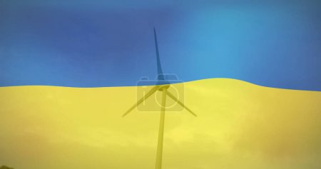 Image of flag of ukraine over wind turbine. ukraine crisis, economic and energetic crash and international politics concept digitally generated image.