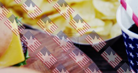 Photo for Image of usa flags over hamburgers. presidents day, independence day and american patriotism concept digitally generated image. - Royalty Free Image