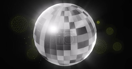 Photo for Image of disco ball over fireworks on black backrgound. New year, party and celebration concept digitally generated image. - Royalty Free Image