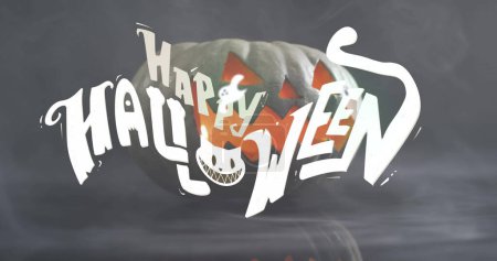 Photo for Image of happy halloween text with cat over pumpkin. halloween tradition and celebration concept digitally generated image. - Royalty Free Image