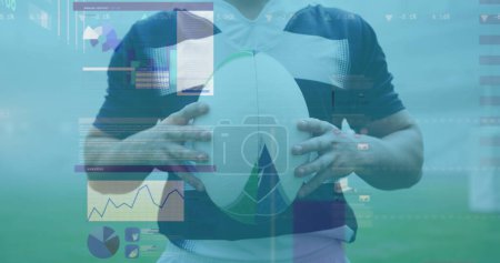 Image of statistics and data processing over caucasian rugby player holding ball. Global sports, data processing and competition concept digitally generated image.