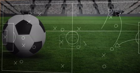 Bild der Zeichnung des Spielplans über dem Stadion und dem Fußball. Sport- und Wettkampfkonzept digital generiertes Image.