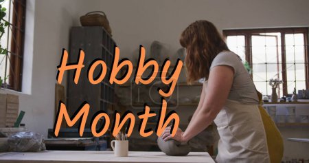 Photo for Image of hobby month text over caucasian woman forming pottery. hobby and celebration concept digitally generated image. - Royalty Free Image