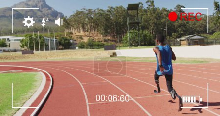 Photo for Image of digital data processing over disabled male athlete with running blades on racing track. global sports, competition, disability and digital interface concept digitally generated image. - Royalty Free Image