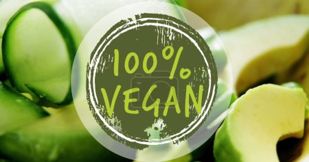 Photo for Image of 100 percent vegan text banner against close up of vegetables. Vegan, organic and healthy food concept - Royalty Free Image
