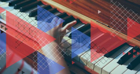 Photo for Image of triangles over boy playing piano. education, development and learning concept digitally generated image. - Royalty Free Image