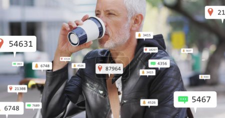 Image of social media icons over senior man drinking coffee. social media and communication concept digitally generated image.