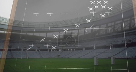 Image of drawing of game plan over empty stadium. sports and competition concept digitally generated image.