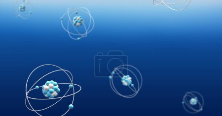 Image of atom models spinning on blue background. Global science, research, connections, computing and data processing concept digitally generated image.
