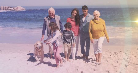 Photo for Image of light spots over happy caucasian family at beach. international day of families and celebration concept digitally generated image. - Royalty Free Image