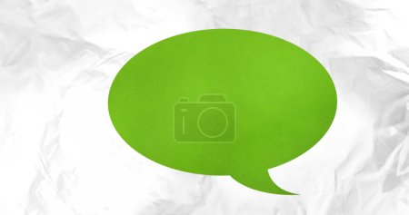 Image de bulle de parole verte sur des taches grises sur fond blanc. Communication et idées concept de fond abstrait image générée numériquement.