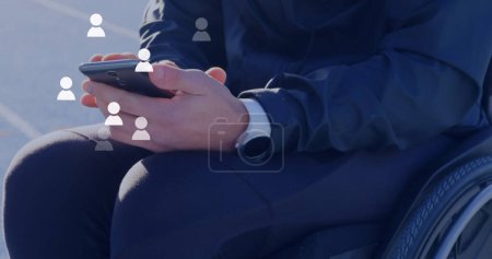 Image of social media reactions over hands of caucasian man using smartphone. Social media, network, communication and technology concept digitally generated image.