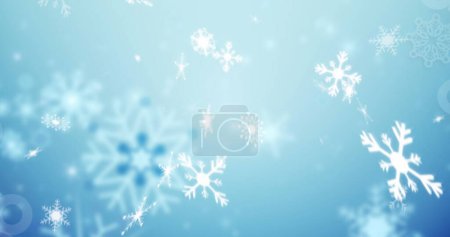 Téléchargez les photos : Image de flocons de neige tombant sur fond bleu. Noel, tradition et concept de célébration image générée numériquement. - en image libre de droit