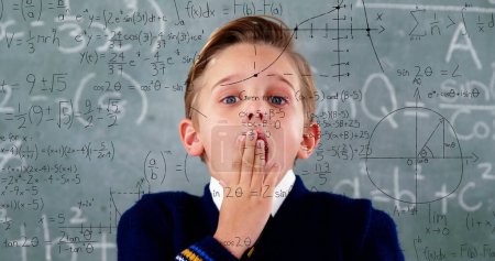 Photo for Image of math formulas over scared caucasian boy over blackboard. learning, education and school concept digitally generated image. - Royalty Free Image