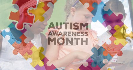 Photo for Image of autism awareness month text over diverse schoolchildren. Autism awareness month and digital interface concept, digitally generated image. - Royalty Free Image