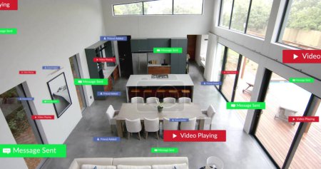Image of social media notifications over empty, open plan kitchen and dining room. Architecture, domestic life, social network, digital interface and communication, digitally generated image.