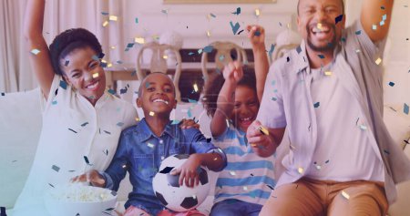 Image de confettis tombant sur une famille afro-américaine heureuse. concept de journée enfants, image générée numériquement.