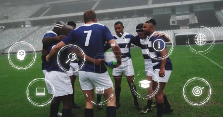 Photo for Image of media icons over diverse male rugby team in huddle at stadium. Sport, team, competition, social network, digital interface, internet and communication, digitally generated image. - Royalty Free Image