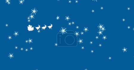 Téléchargez les photos : Image de neige tombant sur le Père Noël en traîneau avec des rennes. Noël, concept de tradition et de célébration image générée numériquement. - en image libre de droit