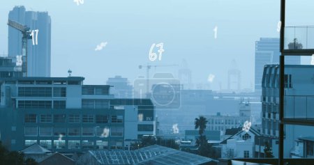 Photo for Image of numbers and data processing over cityscape. Global business, finances, computing and data processing concept digitally generated image. - Royalty Free Image