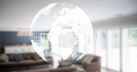Photo for Image of globe moving over empty house interior. Moving house and digital interface concept digitally generated image. - Royalty Free Image