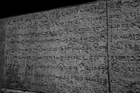 Photo for The Ancient Tamil Language Words In Tanjavur Big Temple, Tamil Nadu, India. 1000 Years Old Ancient Tamil language Ancient Words Stone script in Thanjavur Brihadeeswara Temple. - Royalty Free Image