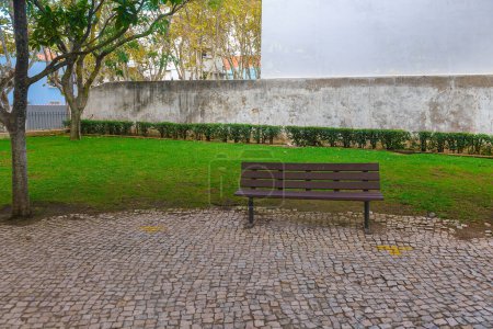 Photo for A bench with a bench in the park - Royalty Free Image