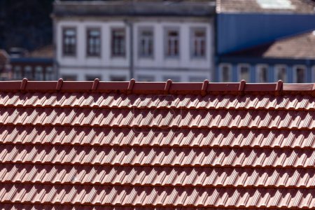 View from above of tiled roofs of the old town of Porto, Portugal.