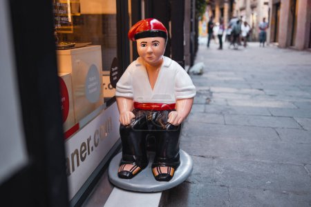 Photo for Barcelona, Spain - October 13, 2022: Caganer in a traditional baretina hat, originally a character in Catalan mythology, a figurine of the Nativity in detail of a man making poop, a typical nativity - Royalty Free Image