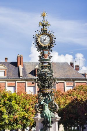 Foto de Beautiful historic street clock in the old town of Amiens, Hauts-de-France, France - Imagen libre de derechos