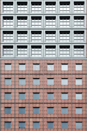 Photo for Picture of a facade of a high rise building with unique windows - Royalty Free Image