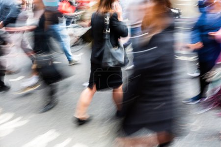 Photo for Creative blurred image of crowds of people on the move in the busy city - Royalty Free Image