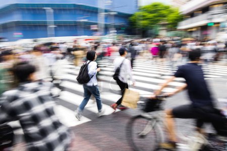 Photo for Picture with camera made motion blur of a crowd of people crossing the famous Shibuya crossing in Tokyo, Japan - Royalty Free Image