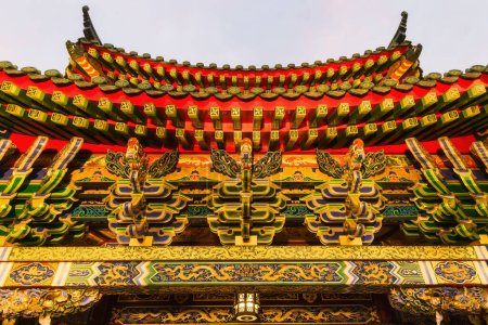 Photo for Roof detail of the Kwan Tai Temple that ist located in Chinatown, Yokohama, Japan - Royalty Free Image