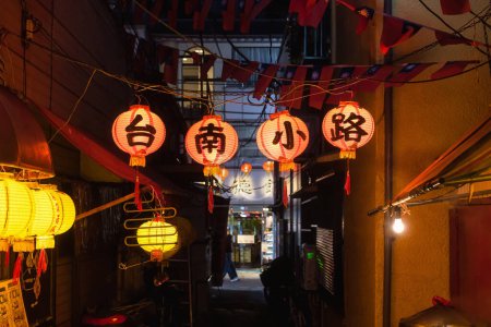 Photo for Narrow alley with illuminated chinese lanterns in Chinatown, Yokohama, Japan, at night - Royalty Free Image