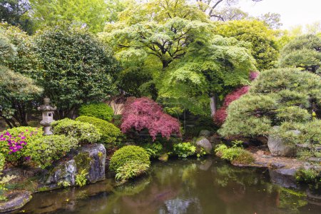Photo for Picture of a public, traditional Japanese park with pond in Ashikaga, Japan - Royalty Free Image